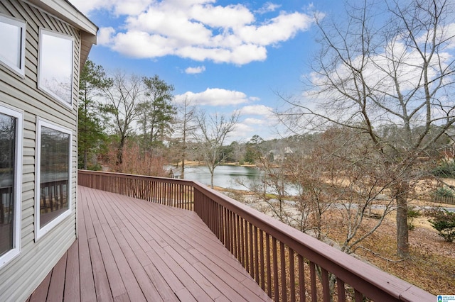 wooden deck featuring a water view