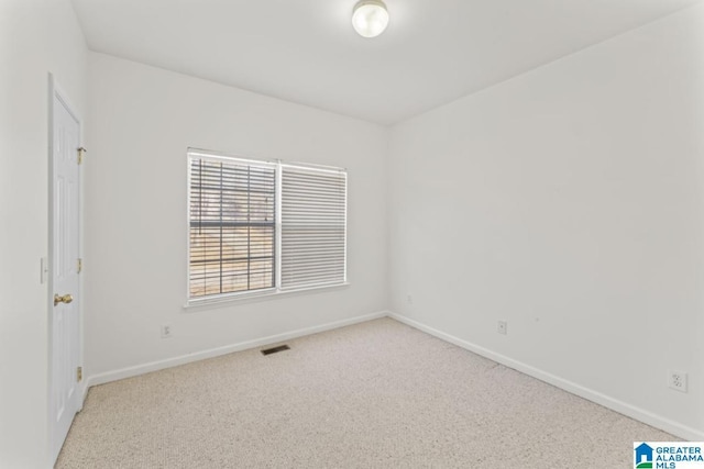 view of carpeted spare room