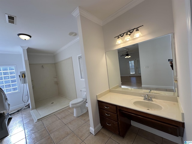 bathroom with tile patterned flooring, ceiling fan, toilet, and crown molding