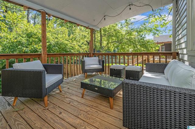 deck featuring outdoor lounge area