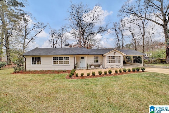 ranch-style house with a front lawn and a carport