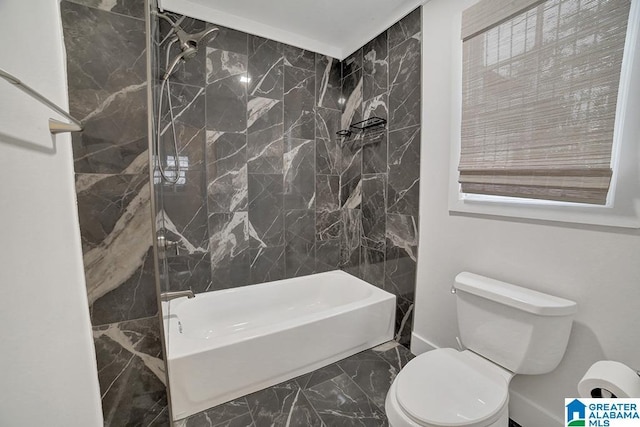 bathroom featuring toilet and tub / shower combination