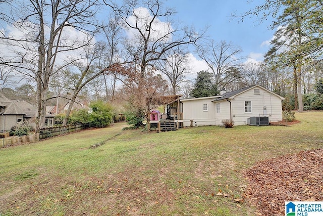 view of yard with central AC