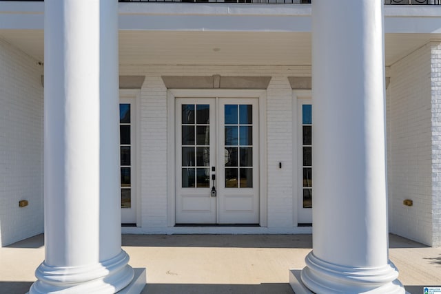 doorway to property featuring french doors