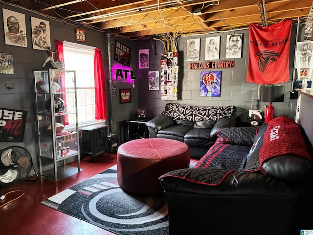 living room featuring concrete flooring