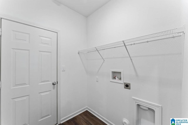 laundry area with dark hardwood / wood-style flooring, hookup for an electric dryer, and hookup for a washing machine