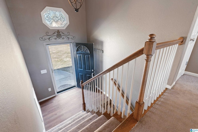 foyer entrance featuring an inviting chandelier