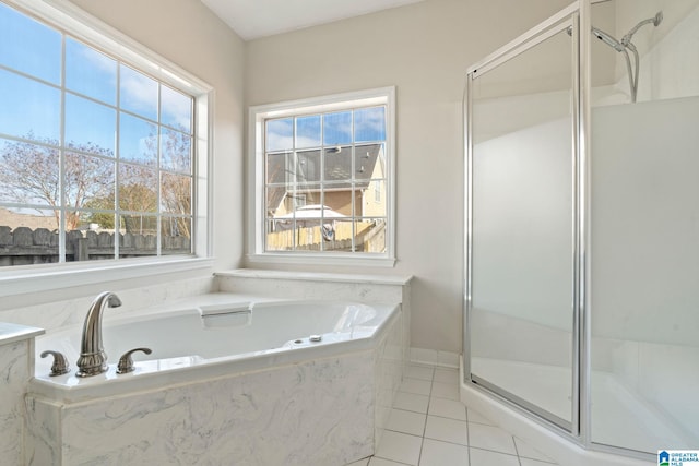 bathroom with plus walk in shower and tile patterned floors