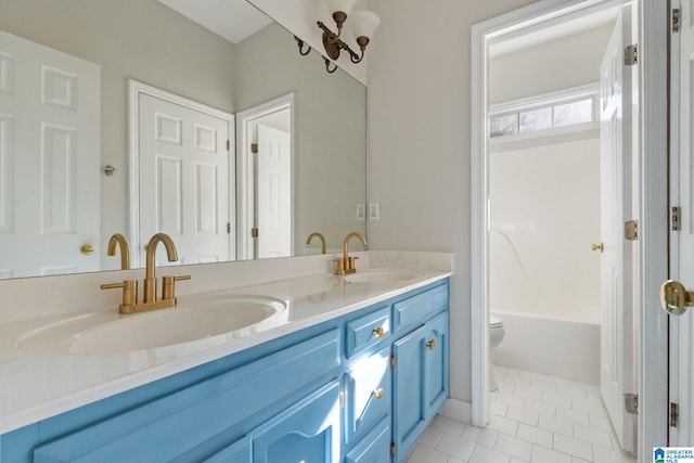 full bathroom with tile patterned floors, vanity,  shower combination, and toilet