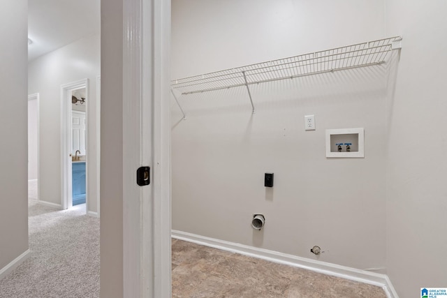 laundry room with electric dryer hookup, hookup for a gas dryer, hookup for a washing machine, and light colored carpet