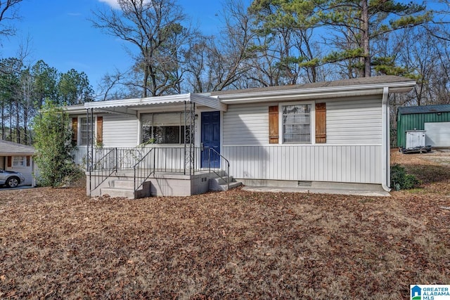 view of front of property featuring covered porch