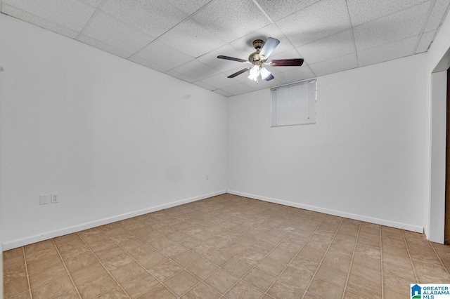 spare room featuring a drop ceiling