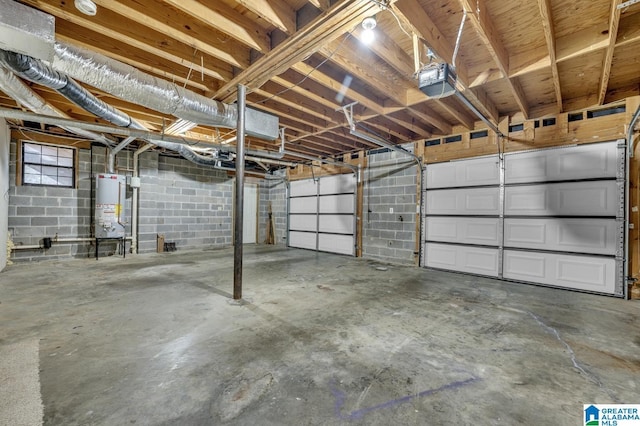 garage featuring a garage door opener and water heater