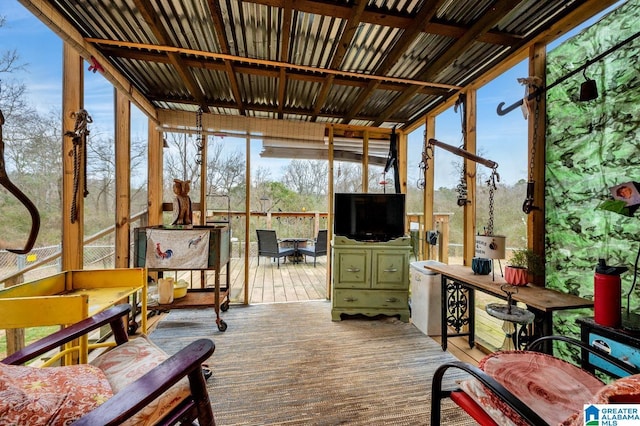 sunroom featuring a wealth of natural light