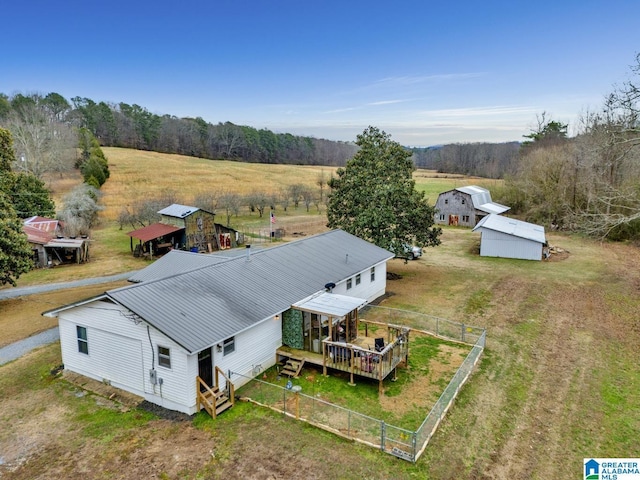 birds eye view of property with a rural view