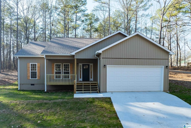 single story home featuring covered porch and a garage