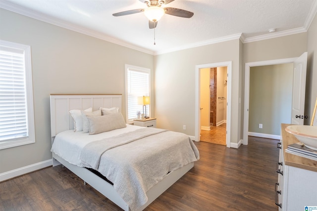 bedroom featuring ceiling fan, ornamental molding, dark wood-type flooring, and multiple windows