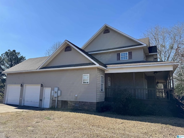 view of front facade featuring a porch and a garage