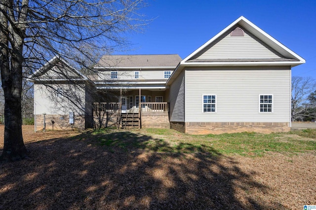 rear view of house with a porch