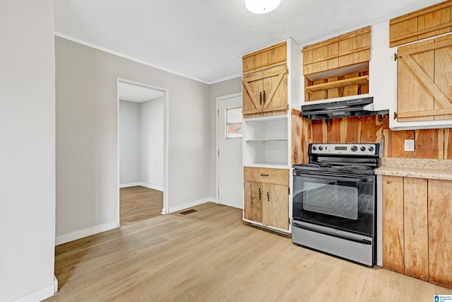 kitchen with electric range, light hardwood / wood-style flooring, and crown molding