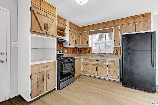 kitchen with light wood-type flooring, sink, range hood, and black appliances