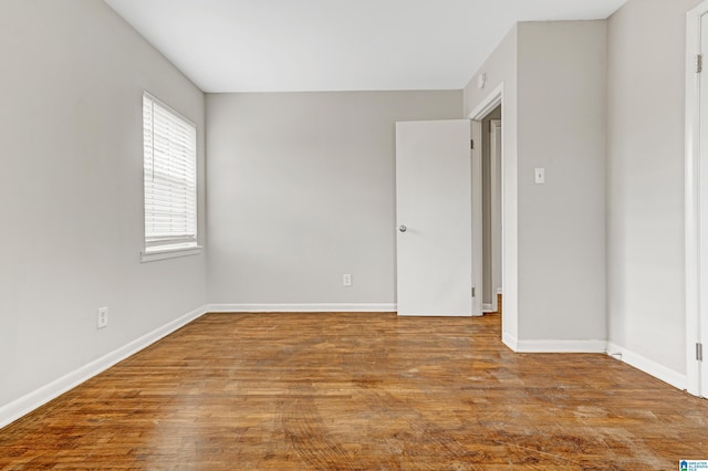 unfurnished room featuring light hardwood / wood-style floors