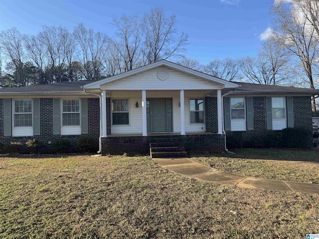 single story home with a porch and a front lawn