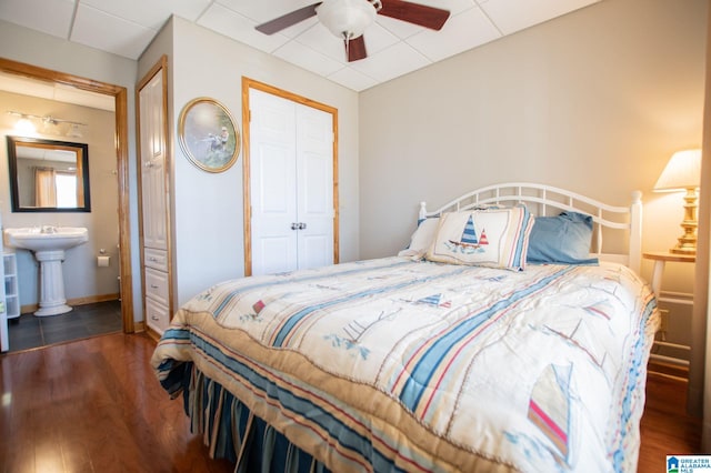 395 Creek Run Rd, Wedowee, AL 36278 - bedroom featuring a ceiling fan, a sink, ensuite bath, wood finished floors, and baseboards