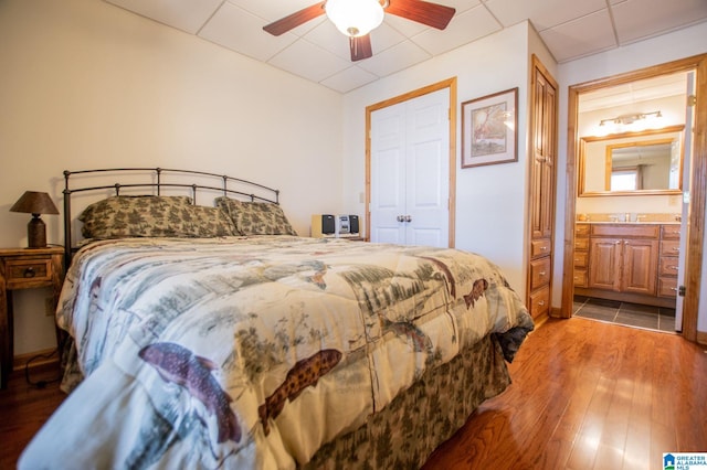 395 Creek Run Rd, Wedowee, AL 36278 - bedroom featuring a sink, ensuite bathroom, wood finished floors, and a ceiling fan