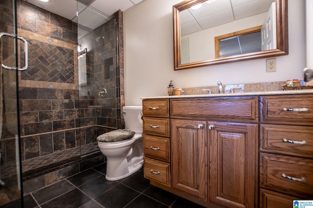 395 Creek Run Rd, Wedowee, AL 36278 - bathroom with a shower stall, toilet, tile patterned floors, vanity, and a paneled ceiling