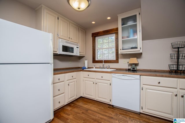 395 Creek Run Rd, Wedowee, AL 36278 - kitchen with a sink, wood finished floors, recessed lighting, white appliances, and glass insert cabinets