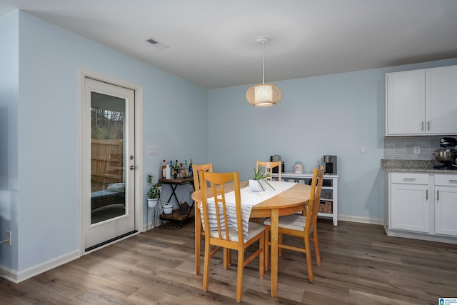 dining space featuring light hardwood / wood-style floors