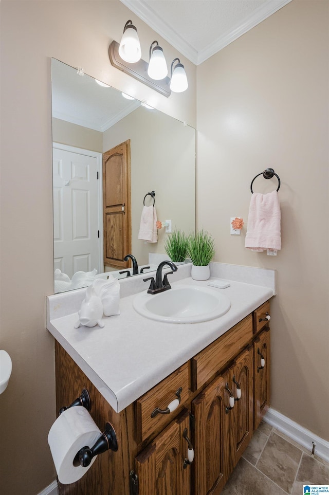 bathroom featuring vanity and crown molding