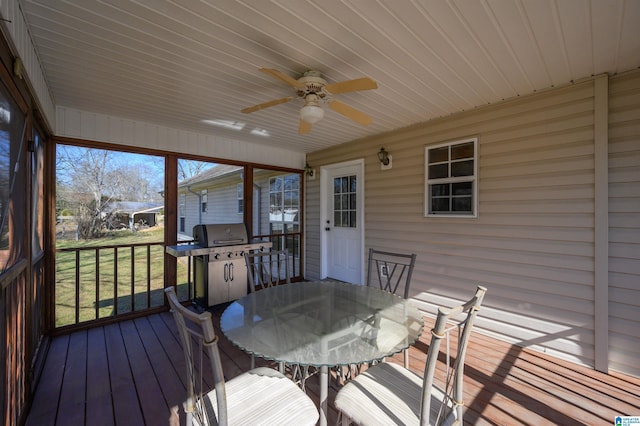 sunroom / solarium with ceiling fan