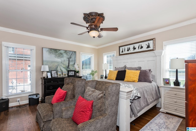 bedroom featuring dark hardwood / wood-style floors, ceiling fan, and crown molding