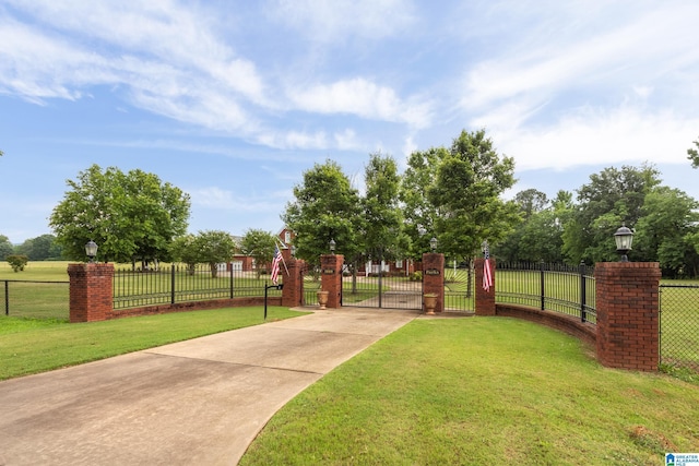 surrounding community featuring a lawn