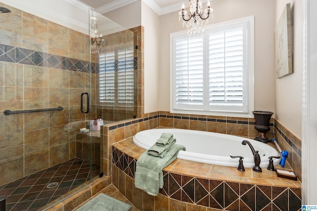 bathroom featuring a notable chandelier, ornamental molding, and shower with separate bathtub