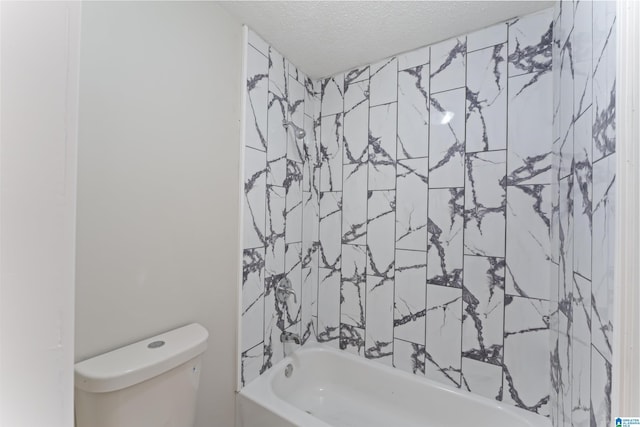 bathroom featuring  shower combination, a textured ceiling, and toilet