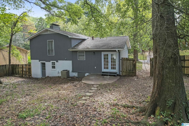 back of house with french doors, a patio area, and central air condition unit