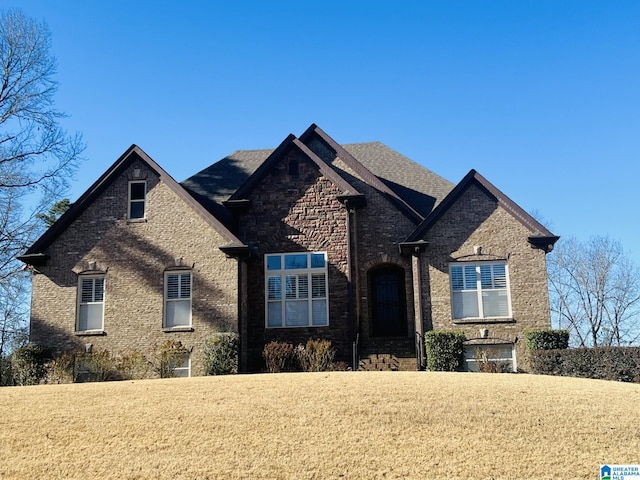 view of front property with a front lawn