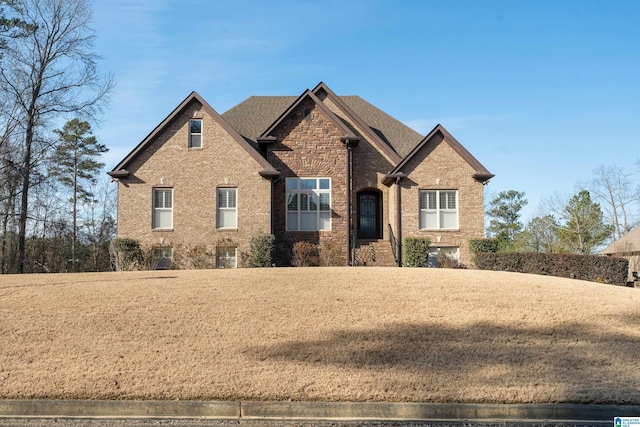 view of front facade with a front lawn