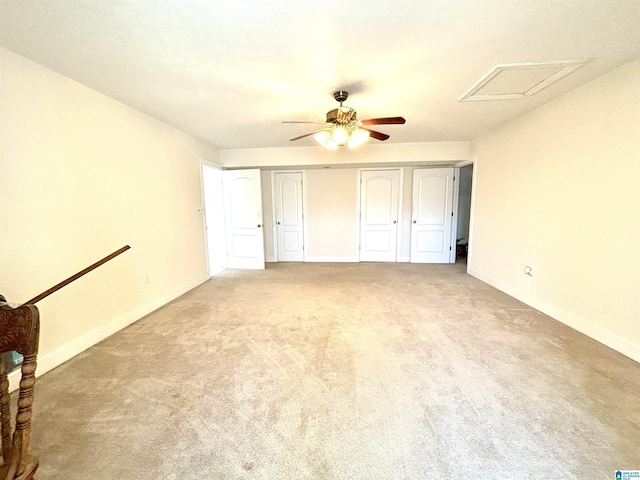 unfurnished bedroom with light carpet and ceiling fan