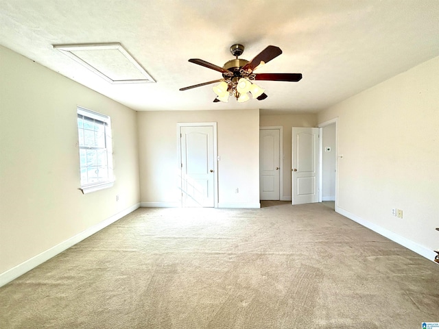 unfurnished bedroom with carpet flooring and ceiling fan