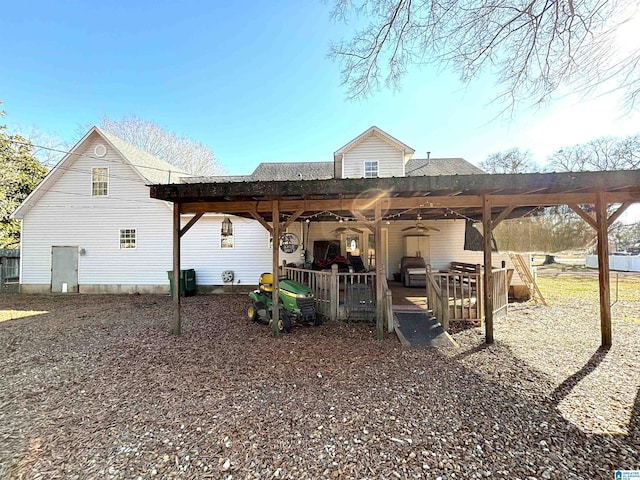 exterior space featuring ceiling fan