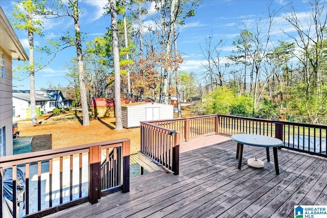 wooden deck with a shed