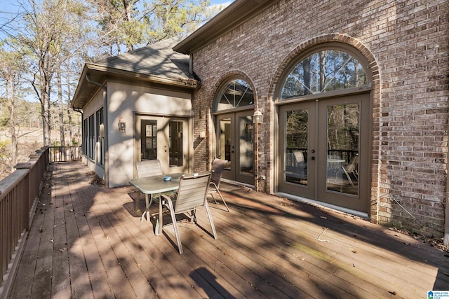 wooden deck with french doors