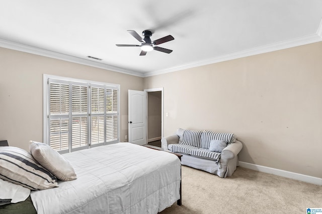 bedroom featuring carpet, ceiling fan, and crown molding