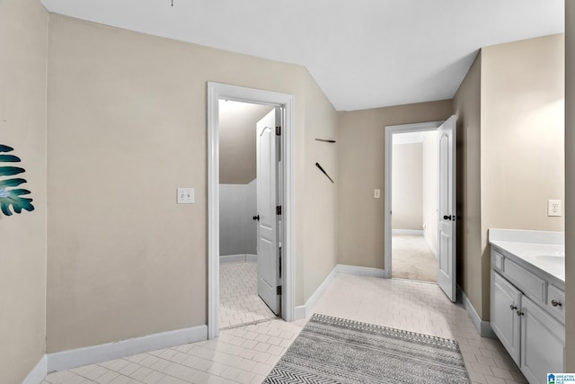 bathroom featuring tile patterned floors and vanity