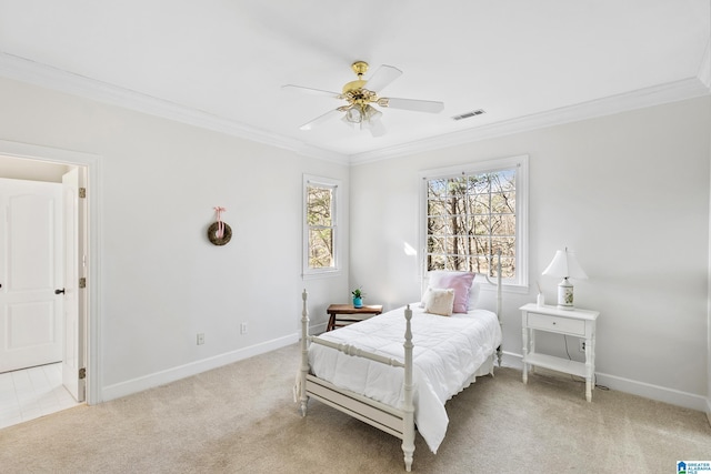 bedroom featuring ceiling fan, light colored carpet, and ornamental molding