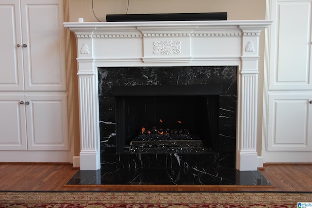 details with wood-type flooring